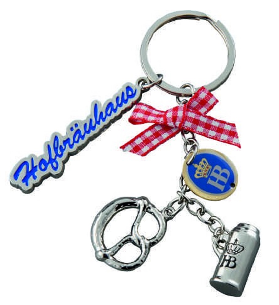 Bayerischer Schlüsselanhänger mit Hofbräuhaus-Schriftzug, rot-weiß karierter Schleife, Brezel- und Bierkrug-Anhängern an silbernem Schlüsselring